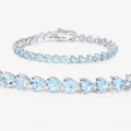 Heart Sky Blue Topaz Prong Silver Tennis Bracelet by Fine Color Jewels