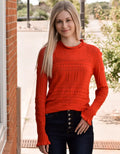 Hollow-Out Knitted Long Sleeve Top With Ruffle by Boutique 23