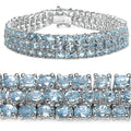 26.20 Ct Oval Sky Blue Topaz Prong Sterling Silver Triple Row Tennis Bracelet by Fine Color Jewels