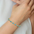 Genuine Swiss Blue Topaz 14K Gold Floral Bracelet by Fine Color Jewels