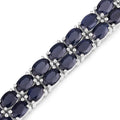 28.80 Cttw Oval Blue Sapphire Prong Sterling Silver Two Row Tennis Bracelet by Fine Color Jewels