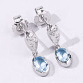 0.80 Ct Oval Blue Aquamarine & Lab Diamond Bezel Silver Dangle Earrings by Fine Color Jewels