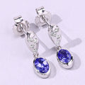 0.88 Ct Oval Violet Tanzanite & Lab Diamond Bezel Silver Dangle Earrings by Fine Color Jewels