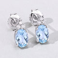 1.20 Ct Oval Blue Aquamarine & Lab Diamond Prong Silver Stud Earrings by Fine Color Jewels