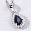 0.80 Ct Pear Blue Sapphire and Lab Diamond Prong Silver Halo teardrop pendant Necklace by Fine Color Jewels