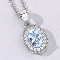 0.60 Ct Oval Blue Aquamarine & Lab Diamond Prong Silver Halo Pendant Necklace by Fine Color Jewels