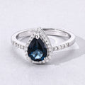 1.15 Ct Pear London Blue Topaz Lab Diamond Prong Silver Halo Pave Bridge Ring by Fine Color Jewels