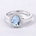 0.83 Ct Pear Blue Aquamarine & Lab Diamond Prong Silver Halo Ring by Fine Color Jewels
