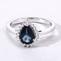 1.15 Ct Pear London Blue Topaz & Lab Diamond Prong Silver Halo Ring by Fine Color Jewels