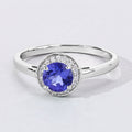 0.47 Ct Round Violet Tanzanite & Lab Diamond Prong Silver Halo Ring by Fine Color Jewels