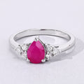 0.80 Ct Pear Pink Mozambique Ruby and Lab Diamond Prong Silver Cocktail Ring by Fine Color Jewels