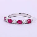 0.80 Ct Pear Pink Mozambique Ruby & Lab Diamond Silver Prong Seven Stone Half Eternity Ring by Fine Color Jewels