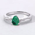 0.65 Ct Pear Green Zambian Emerald & Lab Diamond Prong Silver Pave Crossover Ring by Fine Color Jewels