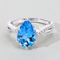 3.50 Ct Pear Swiss Blue Topaz & Lab Diamond Prong Silver Pave Bypass Ring by Fine Color Jewels