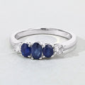 0.69 Ct Oval Blue Sapphire & Lab Diamond Prong Silver Graduated Five Stone Ring by Fine Color Jewels