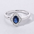 0.55 Ct Oval Blue Sapphire and Lab Diamond Silver Prong Floral Halo Ring by Fine Color Jewels
