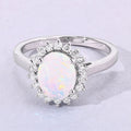 0.90 Ct Oval White Ethiopian Opal and Lab Diamond Prong Silver Halo Ring by Fine Color Jewels