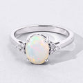 0.90 Ct Oval White Ethiopian Opal and Lab Diamond Prong Silver Cocktail Ring by Fine Color Jewels