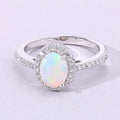0.65 Ct Oval White Ethiopian Opal and Lab Diamond Prong Silver Halo Pave Ring by Fine Color Jewels