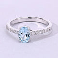 0.60 Ct Oval Blue Aquamarine and Lab Diamond Prong Silver Pave Band Ring by Fine Color Jewels