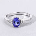 0.75 Ct Oval Violet Tanzanite & Lab Diamond Prong Sterling Silver Bypass Ring by Fine Color Jewels