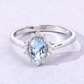 0.60 Ct Oval Blue Aquamarine and Lab Diamond Silver Halo Statement Ring by Fine Color Jewels