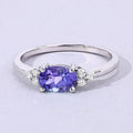 0.75 Ct Oval Violet Tanzanite and Lab Diamond Prong Silver Cocktail Ring by Fine Color Jewels