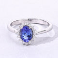 0.75 Ct Oval Violet Tanzanite and Lab Grown Diamond Prong Silver Halo Ring by Fine Color Jewels