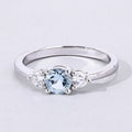 0.38 Ct Round Blue Aquamarine and Lab Diamond Prong Silver Three Stone Ring by Fine Color Jewels