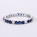 1.01 Ct Round Blue Sapphire and Lab Diamond Prong Silver Eternity Band Ring by Fine Color Jewels
