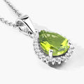 1.46 Ct pear green Peridot and Lab Diamond prong Silver Halo teardrop pendant Necklace by Fine Color Jewels