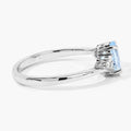 0.60 Ct Oval Blue Aquamarine and Lab Diamond Prong Sterling Silver Bypass Ring by Fine Color Jewels