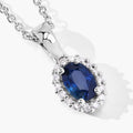 0.55 Ct oval Blue Sapphire and Lab Diamond prong Silver Halo pendant Necklace by Fine Color Jewels