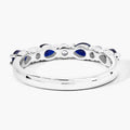 0.80 Ct Pear Blue Sapphire and Lab Diamond Prong Silver Seven Stone Half Eternity Ring by Fine Color Jewels
