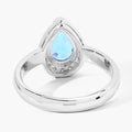 1.30 Ct Oval Swiss Blue Topaz & Lab Diamond Prong Silver Halo Engagement Ring by Fine Color Jewels