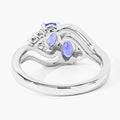 0.88 Ct Oval Violet Tanzanite and Lab Grown Diamond Prong Silver Bypass Ring by Fine Color Jewels