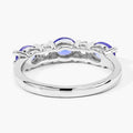 0.99 Ct Oval Violet Tanzanite and Lab Grown Diamond Prong Silver Five Stone Ring by Fine Color Jewels