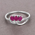 0.66 Ct Oval Pink Ruby & Diamond Prong 14K White Gold Pave Three Stone Knot Ring by Fine Color Jewels