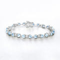 11 Ct Heart Blue Topaz Prong Silver Tennis Bracelet by Fine Color Jewels