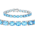 35.20 Ct Oval Swiss Blue Topaz Prong Sterling Silver Tennis Bracelet by Fine Color Jewels