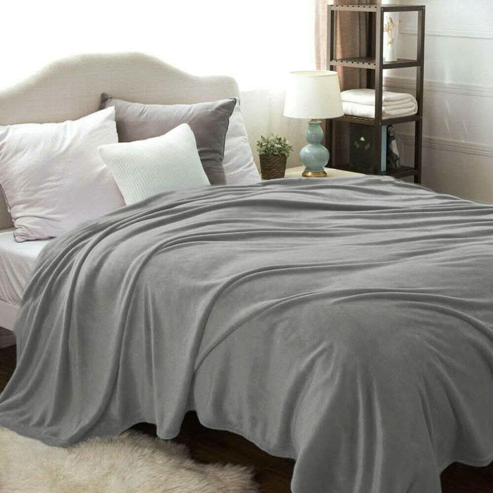 Kathy Ireland Flannel Solid Microplush Bed Blankets by DailySale