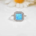 Lab Created Blue Opal Halo Ring by Fine Color Jewels