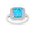 Lab Created Blue Opal Halo Ring by Fine Color Jewels