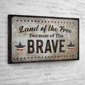 Land Of The Free Because Of The Brave Sign by Tailored Canvases