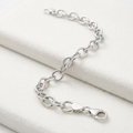 Sterling Silver Rhodium Plated Fancy Charm Bracelet by Avera Group