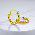 14k Yellow Gold Wavy Texture Hoop Earrings by Avera Group