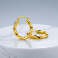 14k Yellow Gold Wavy Texture Hoop Earrings by Avera Group