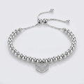 Adjustable Bead Bracelet with Round Charm Cubic Zirconias in Sterling Silver by Avera Group