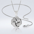 Sterling Silver Pendant with a Ridge Textured Love Knot Design by Avera Group