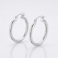 Sterling Silver Rhodium Plated Polished Look Hoop Earrings (25mm) by Avera Group
